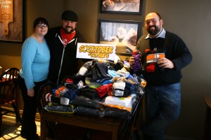 From left: Laura Duguid, Lucas Duguid, and Marc Laferriere organized Socktober at Sophia's. Photo by Cody Hoffman