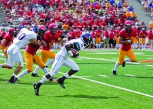 Defensive back Oren Bell with the ball against the Guelph Gryphons. Photo courtesy of Heather Davidson.