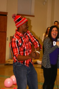 C.J. Williams being auctioned off as a bachelor at the OCOA fundraiser. Photo by Cody Hoffman