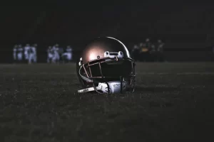 Football helmet lying on field