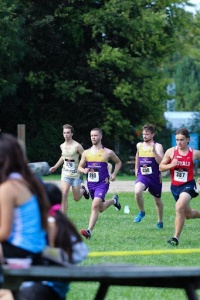 A Laurier Brantford runner in the lead with 3 other runners close behind