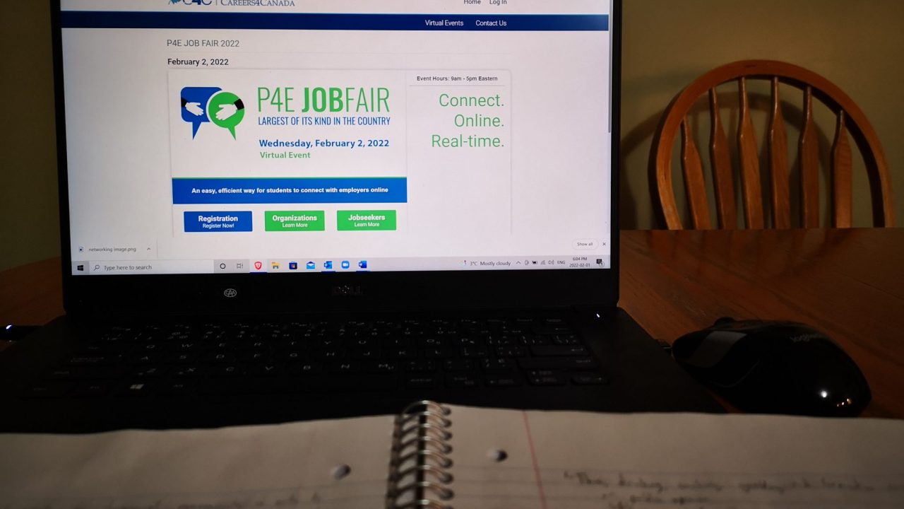 A laptop open to the P4E Job Fair Webpage
