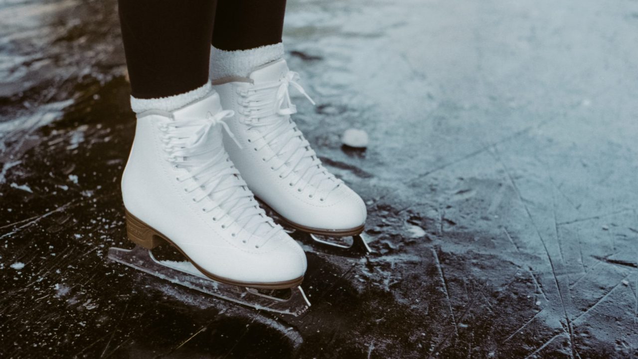 Closeup of skates on ice